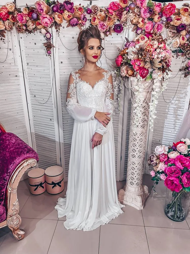 ---A soft pleated chiffon wedding dress, this wedding dress is enhanced with sheer long sleeves--